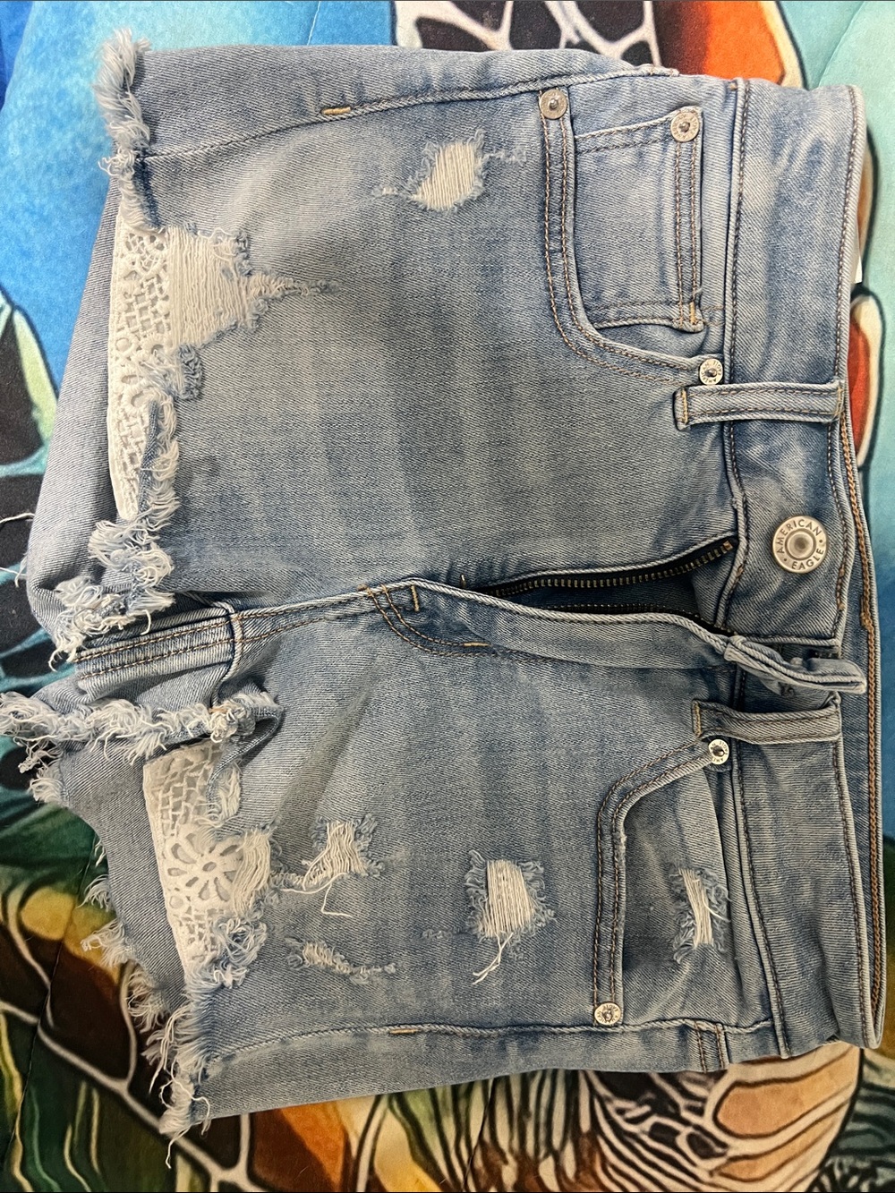 American Eagle Outfitters Light Blue Distressed Denim Shorts with Lace Panels